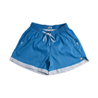 Blue athletic shorts with a white drawstring and white trim along the hem, laid flat on a light gray background.