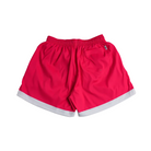 Bright red swim trunks with a white contrast trim at the hem and a back pocket, shown flat on a light gray background.